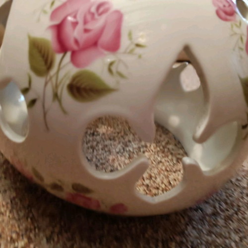 Ceramic lamp shade used with decorative design