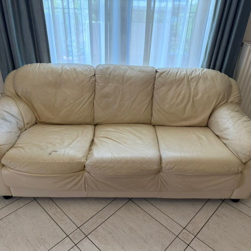 Two-seater sofa used beige leatherette with free three-seater sofa