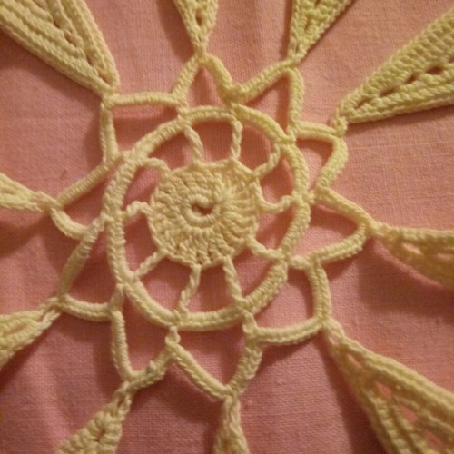 Knitted doily used with 10 shaped leaves, beige color