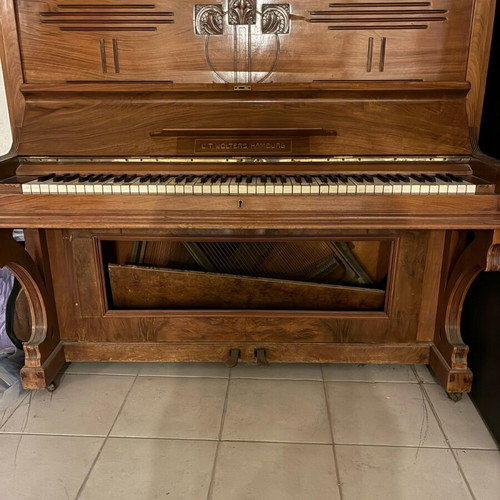Wooden piano used, antique with key wear