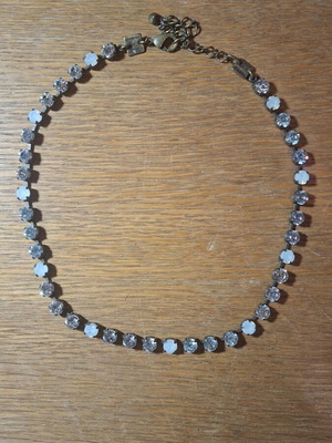 Konplott necklace with transparent and milky crystals