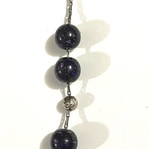 Purple worry beads used