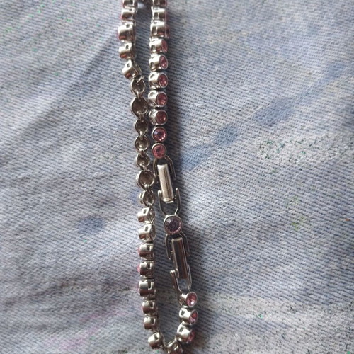 Steel bracelet with pink stones in excellent condition