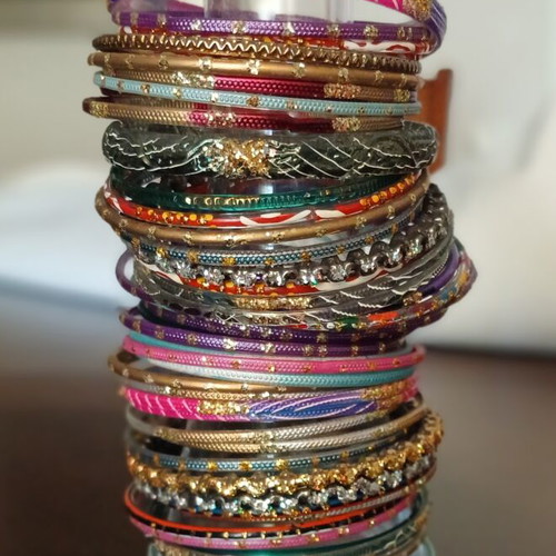 Indian glass bracelets like new, set of 54, colorful and decorated