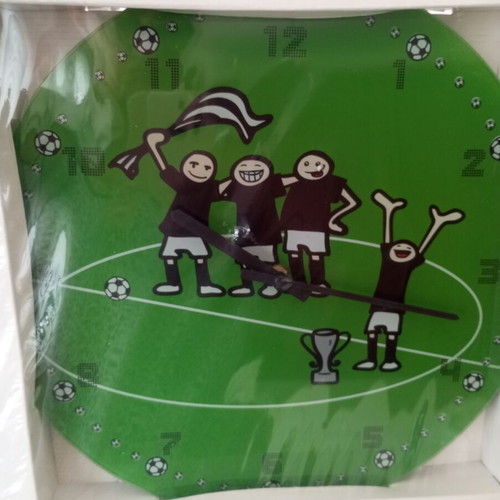 Wall clock with football theme, quartz mechanism, glass/plastic surface