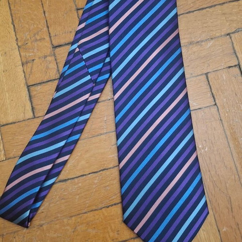 Otomelara tie with diagonal stripes in purple, black, mauve and blue