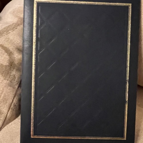 Photo album like new, leatherette cover
