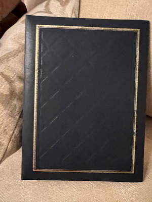 Photo album like new, leatherette cover