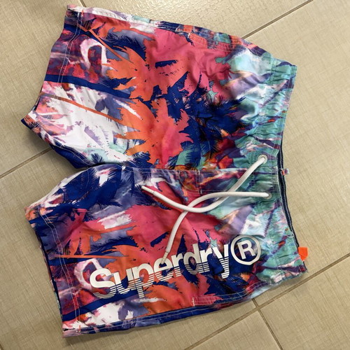 Superdry men's swim shorts with colorful tropical design, size L