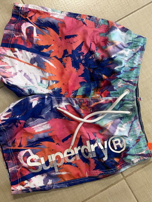 Superdry men's swim shorts with colorful tropical design, size L
