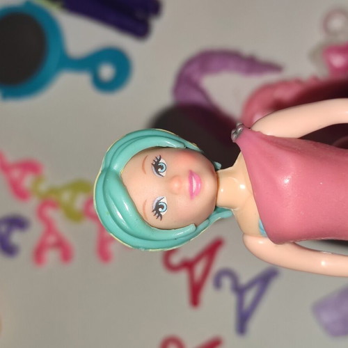 Polly Pocket bag with 9 dolls and accessories used