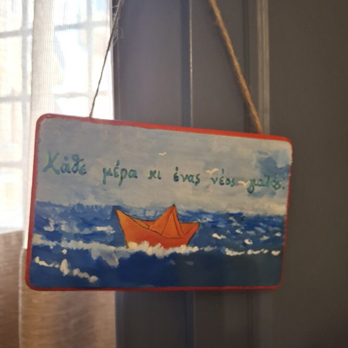 Handmade wooden sign "Every day a new shore"