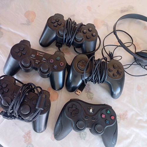 Various controllers used with free Sony headphones