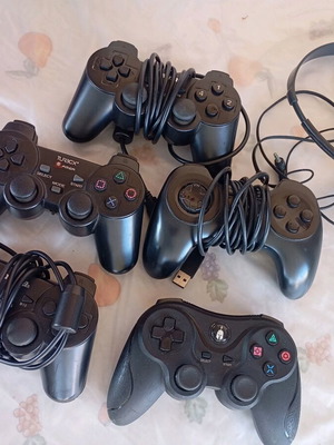 Various controllers used with free Sony headphones