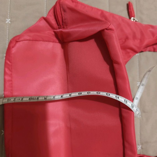Nylon handbag like new, pink fluo with 3 compartments