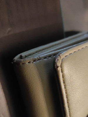 Folli Follie khaki wallet with minor wear used