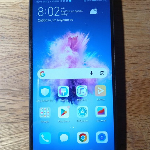 Huawei smartphone 2018 model, black, with 2 extra chargers