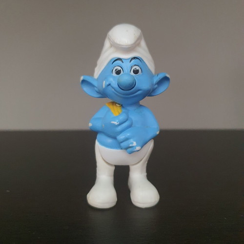 Greedy Smurf figure used with functional mechanism
