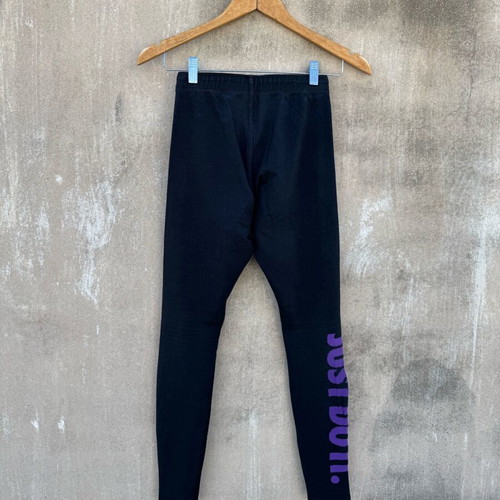 Nike legging used with knee defect, black and purple, size S