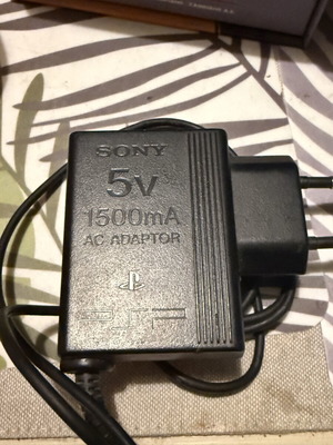 Sony PSP power adapter used, 5V 1500mA original