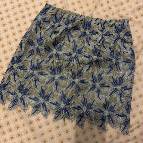 Shein short skirt with blue and grey floral design