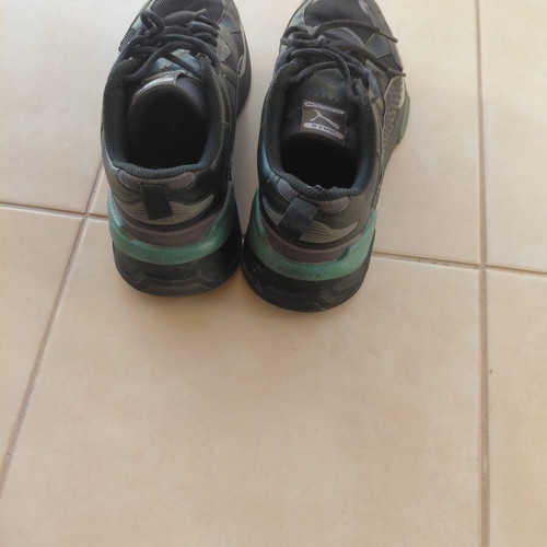 Puma men's athletic shoes size 45 used, black and green