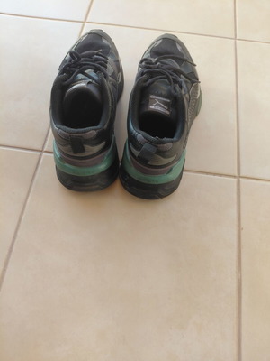 Puma men's athletic shoes size 45 used, black and green