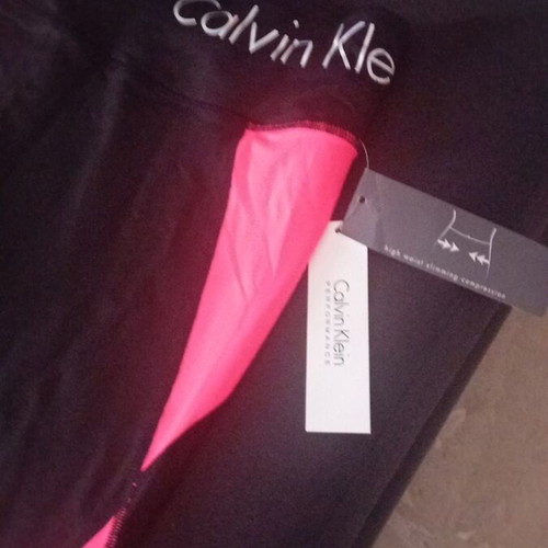Calvin Klein sports leggings new, black with orange details