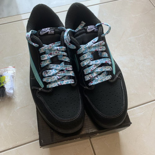 Nike Air Jordan black sneakers with floral laces