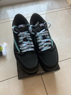 Nike Air Jordan black sneakers with floral laces