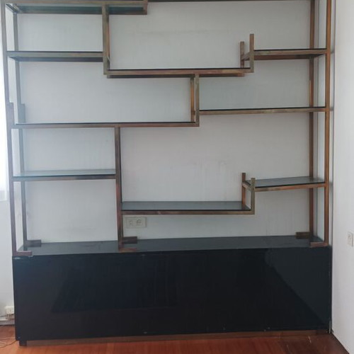 Bookcase used with asymmetric design, black lacquer and bronze detail