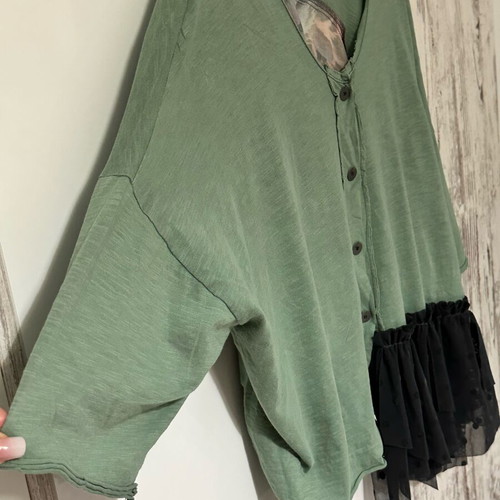 Asymmetric blouse made to order with Donatella details in black and green
