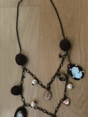 Necklace chain with brown wool fabric and metal details, unused