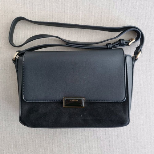 Carpisa black crossbody bag used with magnetic clasp