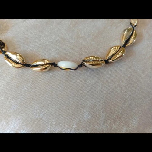 Gold necklace with shells like new