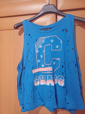 Peace and Chaos top like new, blue multicolor with design holes
