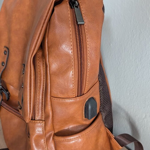 Vintage unisex backpack in brown faux leather with laptop compartment