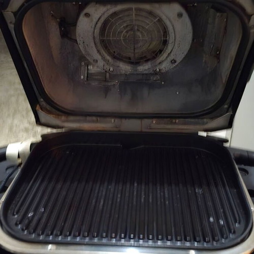 Ninja Woodfire OG701EU Electric BBQ Grill & Smoker used with stand and accessories