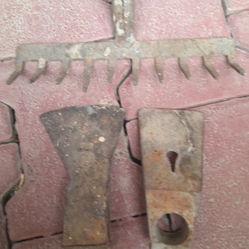 Old tools used, axe and rake