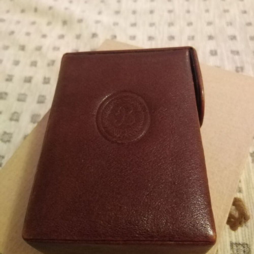 Cigarette pack case used, brown