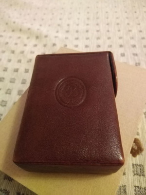 Cigarette pack case used, brown