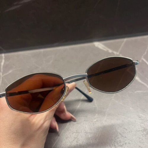 Sunglasses used, brown and black lenses