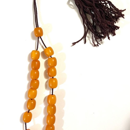 Orange komboloi with tassel used