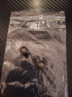 Valve caps Opel black with gray detail, like new, set of 2
