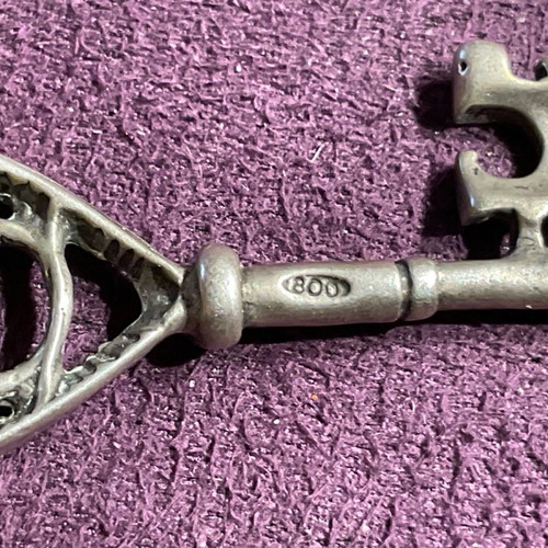 Silver pendant in key shape made of 800 silver
