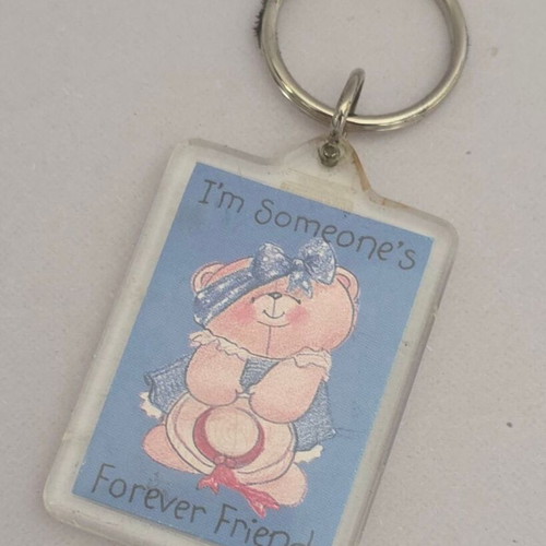 Forever Friends keychain with pink teddy bear and blue outfit
