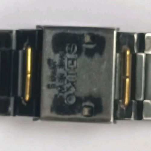 Seiko 2A32-5059 wristwatch used with black bracelet