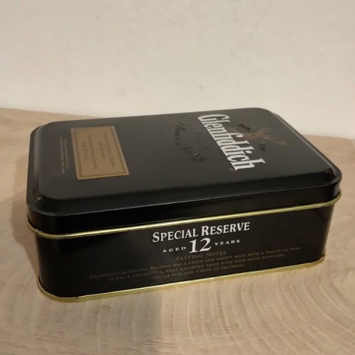 Mini-bar in metal box like new with 4 sealed bottles