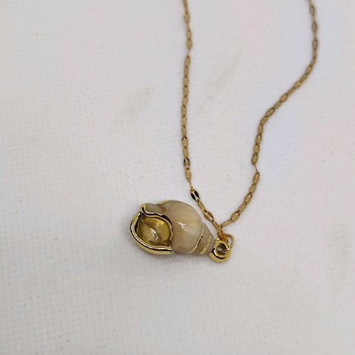 Shell necklace made of stainless steel like new, beige and gold