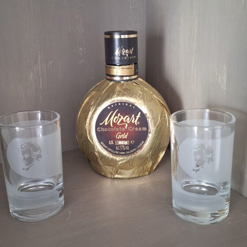 Mozart chocolate cream gold bottle with two promotional glasses used